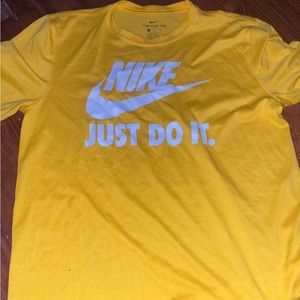 Yellow nike shirt, size medium